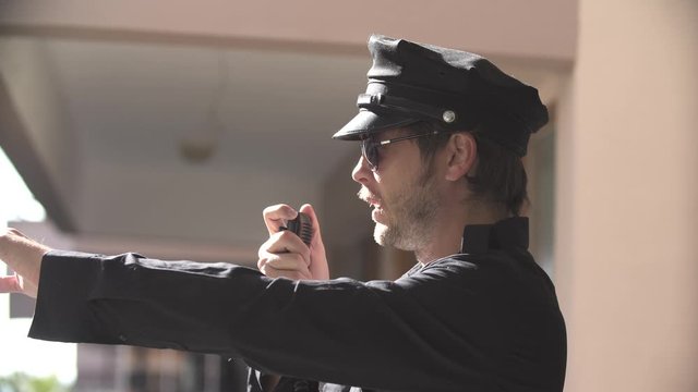 a young police officers on the street inspecting and investigating the crime and incident