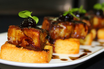 pan fried duck foie gras on toasted brioche bread and amarena cherry © libin