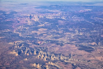 Colorado Rocky Mountains Aerial view from airplane of abstract Landscapes, peaks, canyons and rural cities in southwest Colorado and Utah. United States of America. USA.