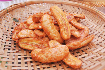 Thai style banana fries sprinkled with nuts and pandan aroma.