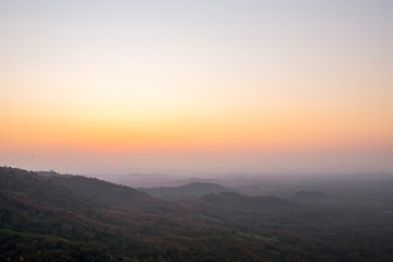 Fototapeta premium Beautiful Landscape of mountain layer in morning sun ray and winter fog at Doi Hua Mae Kham, Mae Salong Nai, Chiangrai, Thailand