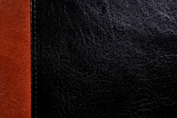 Black and brown animal skin background.
