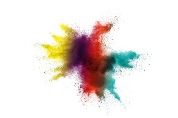 Freeze motion of colorful color powder exploding on white background.  Paint Holi.