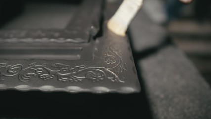 Forge workshop. Smithy manual production. The product is artificially aged. Gold powder painting of...
