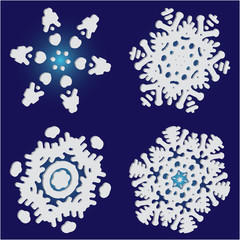 Kit of simple, beautiful snowflakes on blue background.