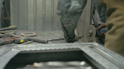 Forge workshop on table. Smithy manual production. Work on the product. Ruler, angle grinder. The...