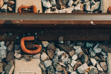 Close up rail brackets or fasteners.Vintage color concept , Railway track