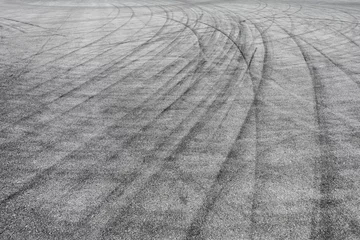 Poster Skid marks tire marks on motor race track asphalt international circuit.shoot down view. © ABCDstock