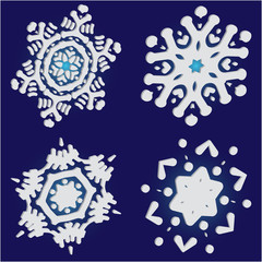 Collection of paper cut isolated snowflakes on blue background.