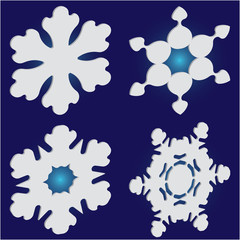 Kit of simple christmas snowflakes on blue background.