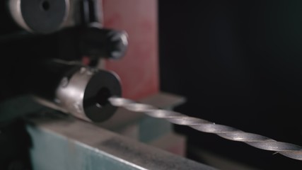 Forge workshop on table. Smithy manual production. Metal pipe craft electric twist wrought iron machine. The blacksmith makes iron products for manufacture of fireplaces, stoves.