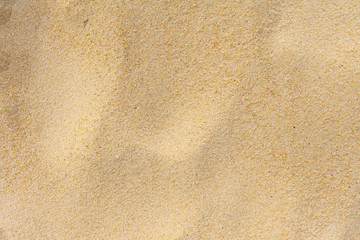 Beach sand of texture as background