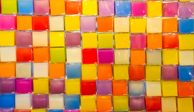A variety of colorful candles in candle shops
