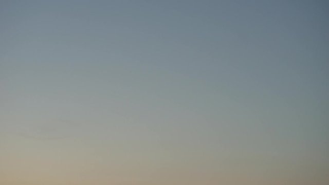 Tilt down from sky to a view of Rome from Giardino degli Aranci during sunset.