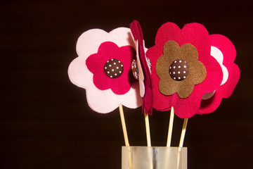 Felt flowers for party table decorations.