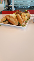 fresh rolls on a plate and white background