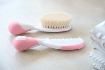 Fototapeta na wymiar baby comb and brush, comb and brush kit, comb and brush