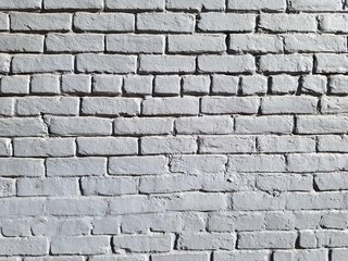 Fototapeta premium Gray Painted Brick Wall with Stretcher and Header Courses