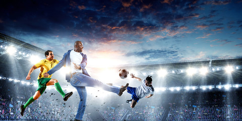 Soccer man in action with ball. Mixed media