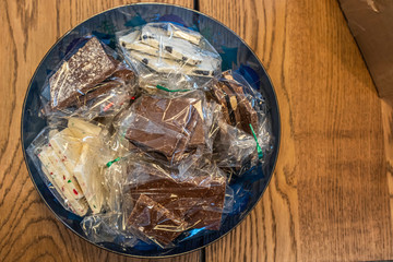 Assorted Chocolates wrapped in plastic in a hamper