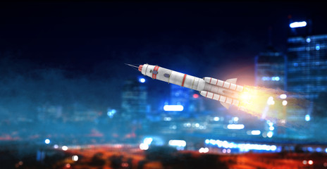Fototapeta na wymiar Rocket in the sky. Mixed media