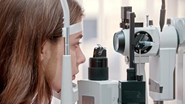 ophthalmologist - glow moving on the womans eye