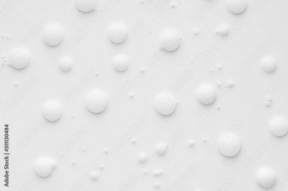 Poster white liquid paint texture with random bubbles and stains as modern abstract background.