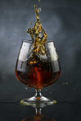 Spray in cognac glass