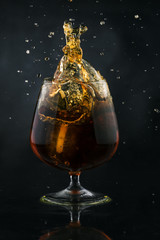 Spray in cognac glass