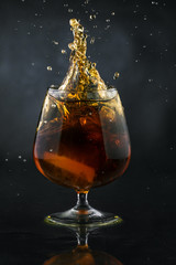 Spray in cognac glass
