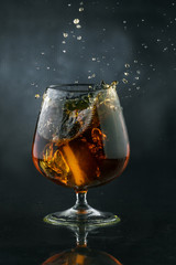 Spray in cognac glass