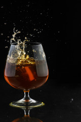 Spray in cognac glass