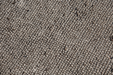 Texture of ancient Roman stone tiles in Villa Adriana