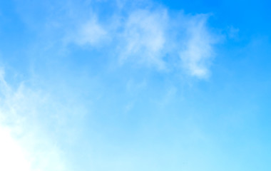 Naklejka na ściany i meble ิblue sky with white clouds as a background, bright natural beautiful sky