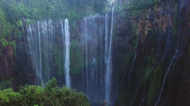 Aerial shot of impressive Tumpak Sewu Waterfalls, Java, Indonesia
