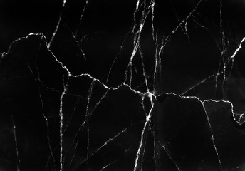 Dark black marble texture with white cracked wave patterns abstract for nature dark background