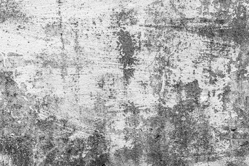 Texture of a concrete wall with cracks and scratches which can be used as a background