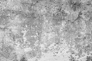 Texture of a concrete wall with cracks and scratches which can be used as a background