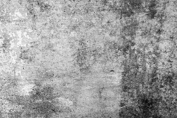 Fototapeta premium Texture of a concrete wall with cracks and scratches which can be used as a background