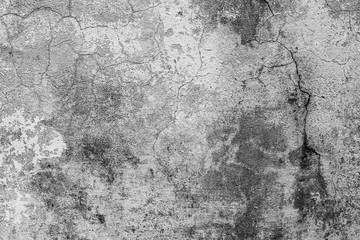 Texture of a concrete wall with cracks and scratches which can be used as a background