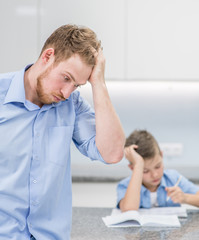 Fototapeta premium Father worries about bad study their child