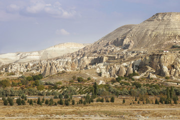 View on slope of Cappadocia hill with many bizarrre stones in sunny and dry day.  Autumn 2019.