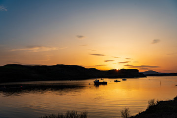 bay ocean fishing boats sunset landscape blue sky