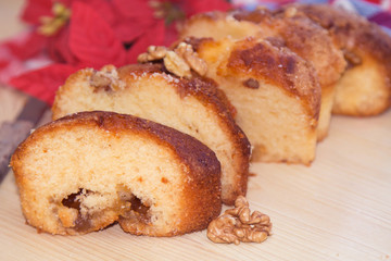 Sweet Christmas dessert with nuts and orange