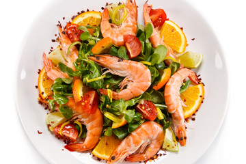 Prawns with vegetables on white background