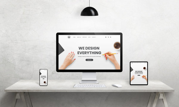 We design everything agency resonsive web page on computer, tablet and phone display. Modern devices with thin edges. Modern office, studio desk