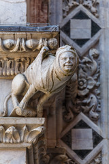 Detail of the medieval building in the historic centre of Siena town, Italy