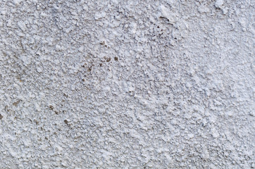 Voluminous texture of the concrete wall. Gray background.