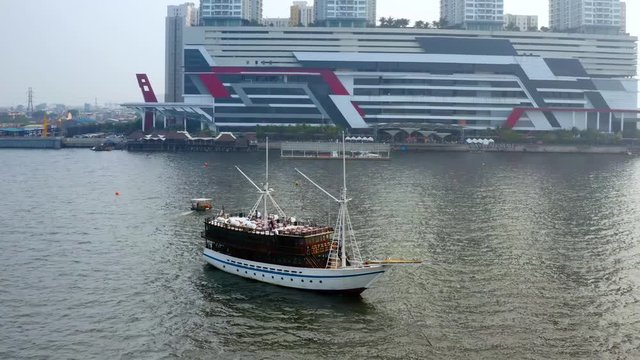 Phinis boat with shopping mall in Muara Angke
