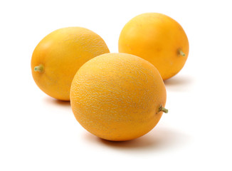 yellow honeydew melons isolated on white background 